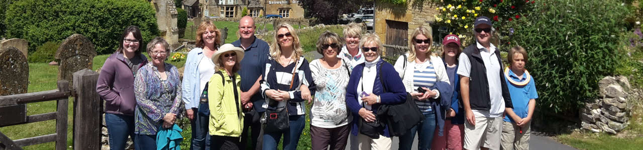 A tour group enjoying their one day in the Cotswolds