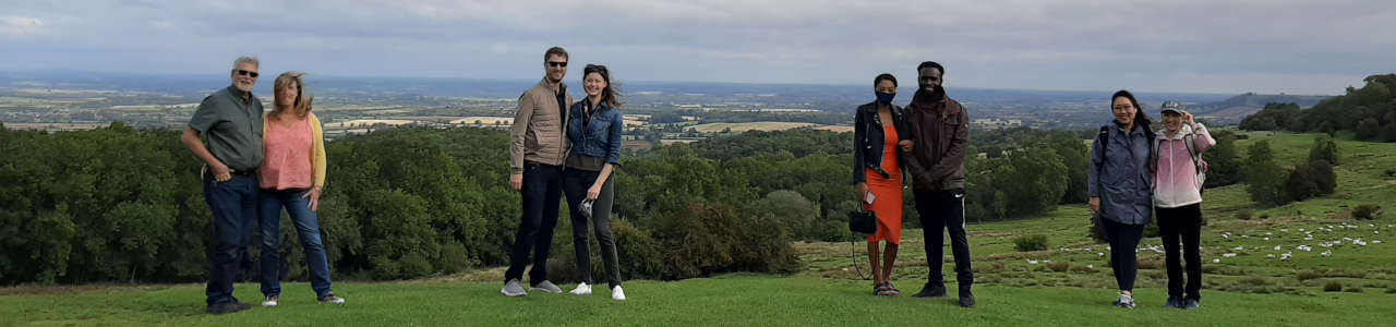 A group of people enjoying a Go Cotswolds tour of the Cotswolds